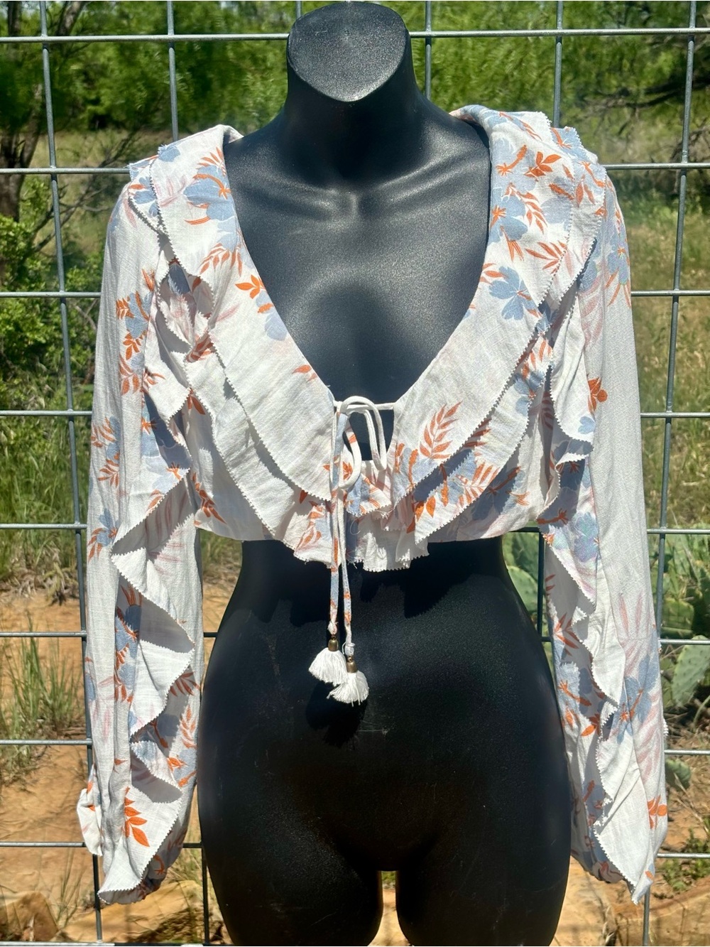 Olivaceous White Ruffle Tie-Front Crop Top with Blue & Orange Floral Print